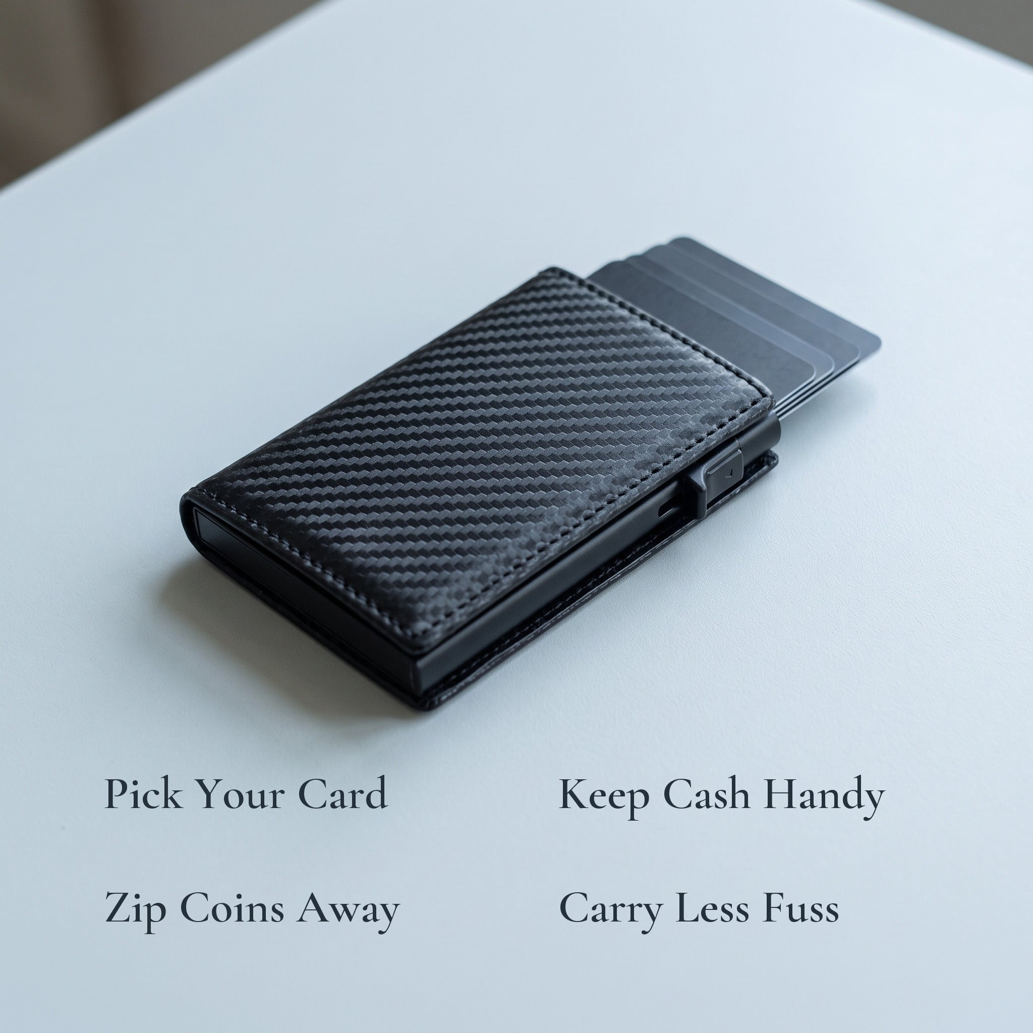 Carbon-pattern wallet with four benefit callouts